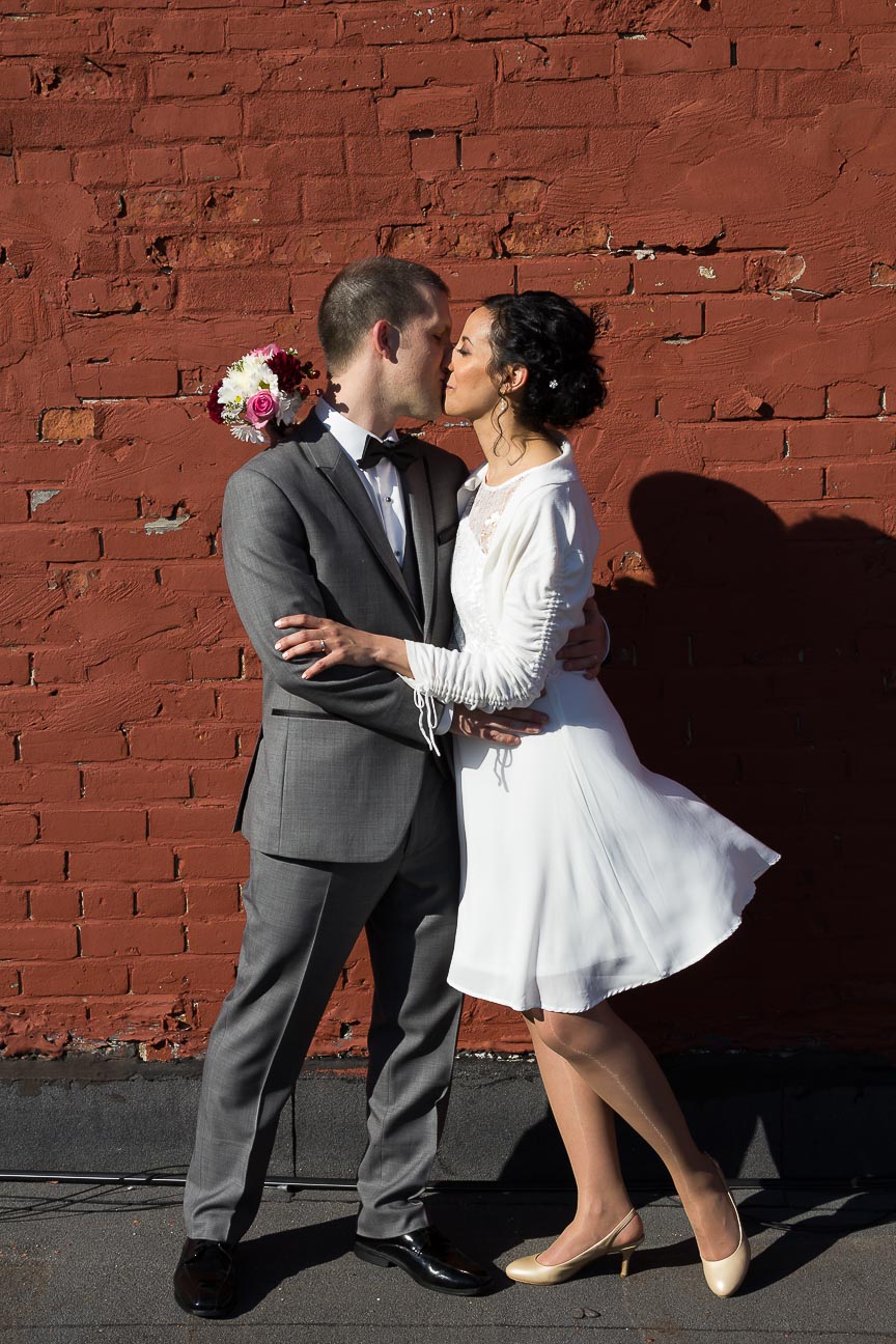 Photo of bride and groom kissing by Marili Clark Photographer.