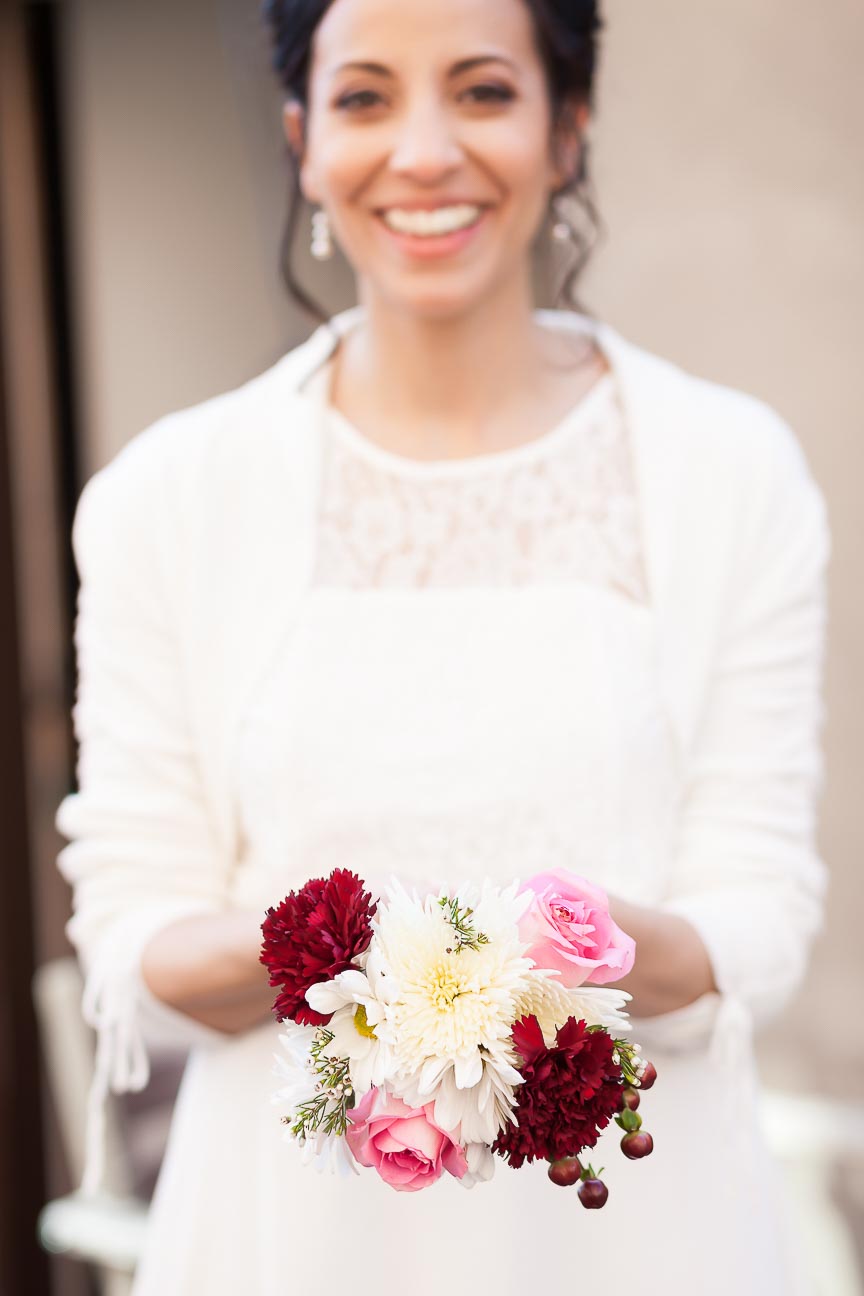 Photo of bride showing her bouquet by Marili Clark Photographer.