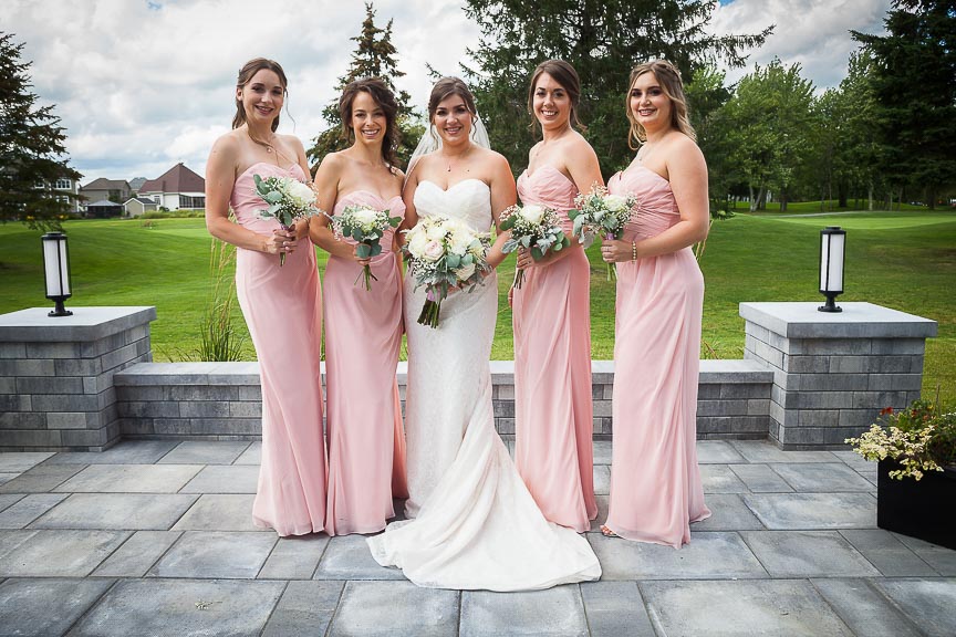 Photo of bride and bridesmaids by Marili Clark Photographer.