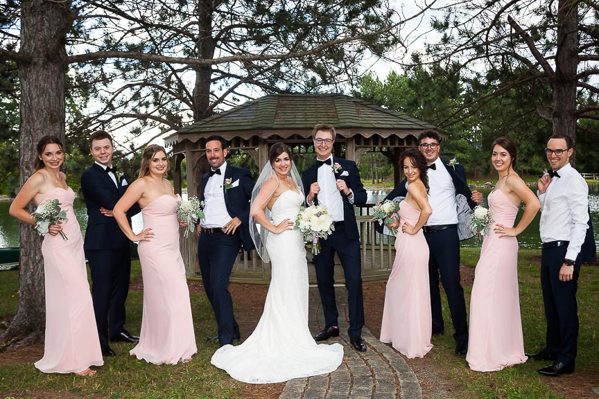 Photo of bride and groom, best men and bridesmaids by Marili Clark Photographer.