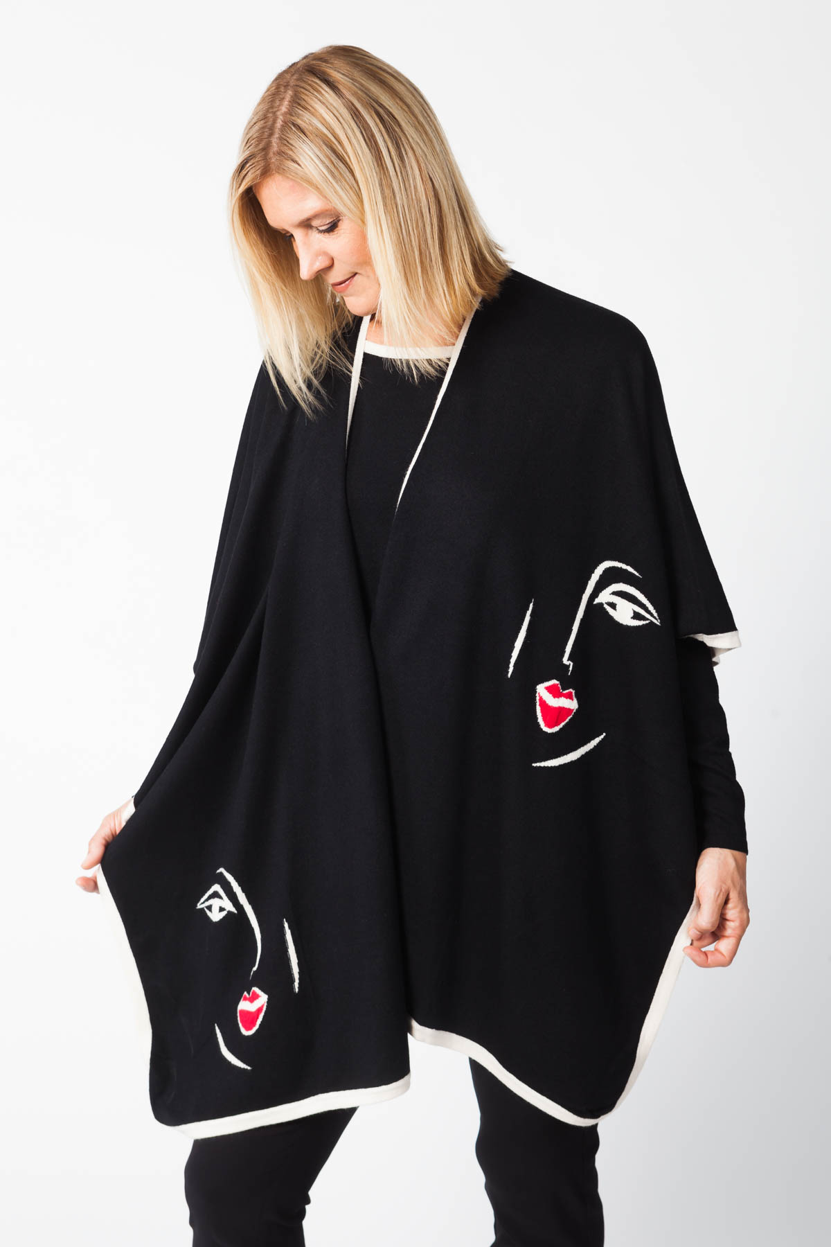 Ecommerce photo of woman in poncho
